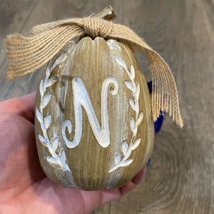 Pumpkin decor with initials “N”